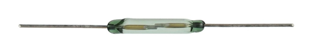 A small cylindrical Standex KSK-1A82 glass reed switch with two metal leads extending from each end, designed for detecting magnetic fields and suitable for high current applications in electronic circuits. by Standex Detect