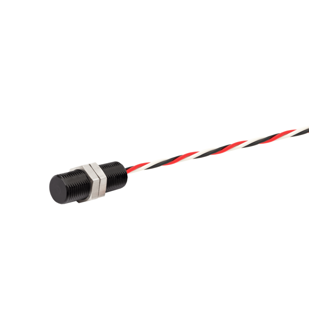 A cylindrical black position sensor with a threaded housing mounts securely, attached to twisted red, white, and black wires. The sensor and wiring are isolated on a white background. by Standex Detect