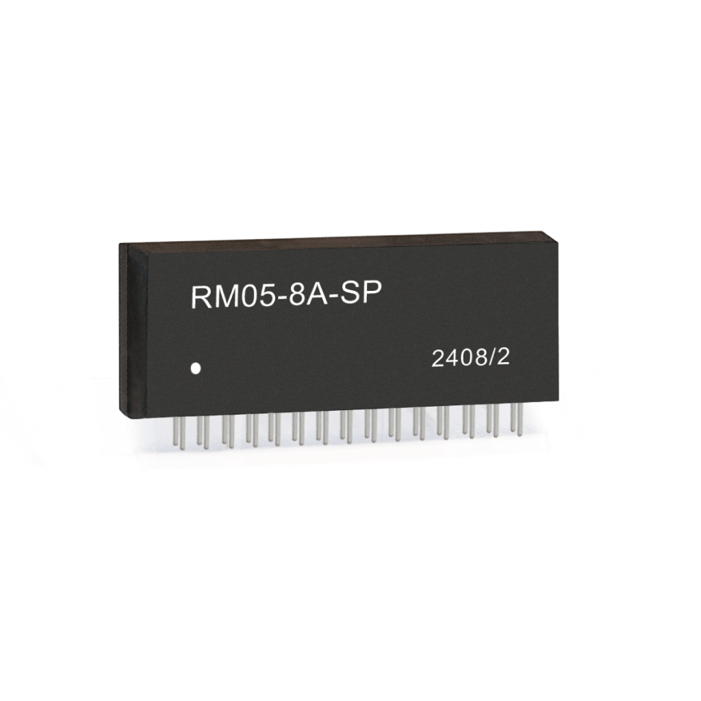 A black rectangular electronic chip, likely a Reed Relay, labeled RM05-8A-SP and 2408/2, features multiple metal pins protruding from the bottom side for circuit board insertion. by Standex Detect