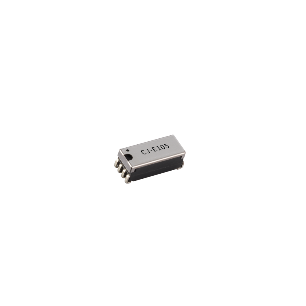A small integrated circuit chip labeled CJ-E105 with metal pins on both sides, resembling a C Series Reed Relay, isolated on a white background. by Standex Detect