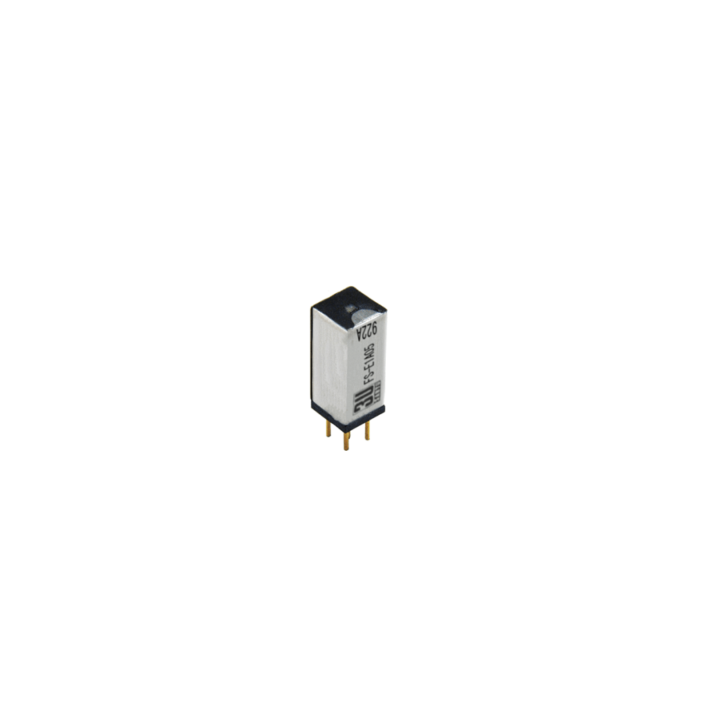 A small rectangular electronic component, likely an FS Series Reed Relay, with a silver metal casing, black ends, and two gold pins at the bottom, isolated on a white background. by Standex Detect