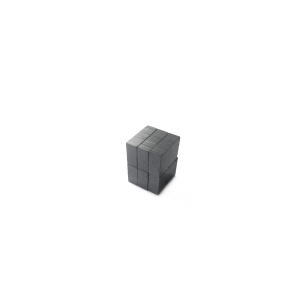 A small, dark gray cubic object made up of smaller stacked cubes—resembling hard ferrite magnets—is centered on a white background. by Standex Detect