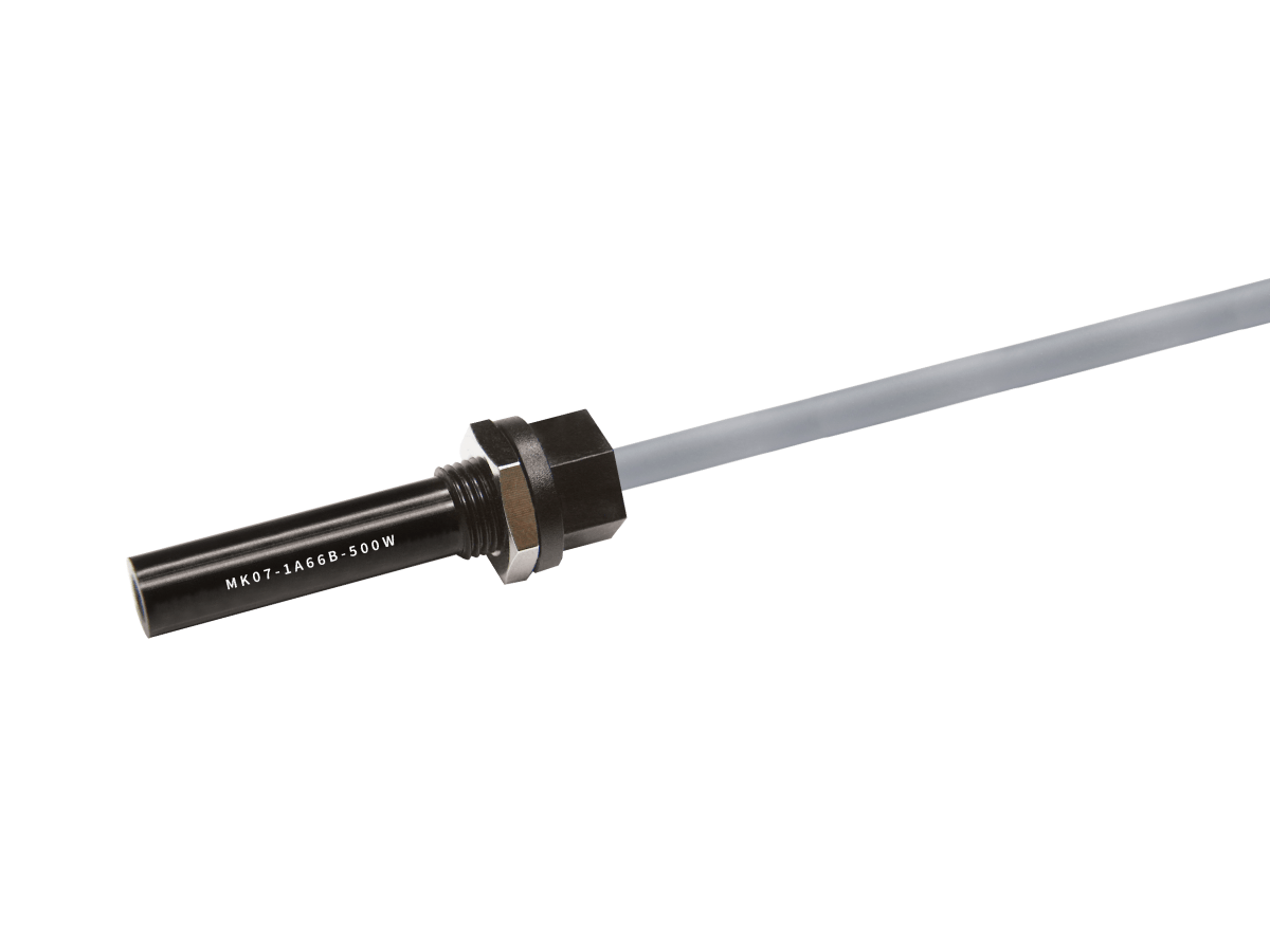 A cylindrical black MK07 Series reed sensor probe with a threaded metal nut and a long grey cable attached, isolated on a white background. The probe has white printed text near the threaded section. by Standex Detect