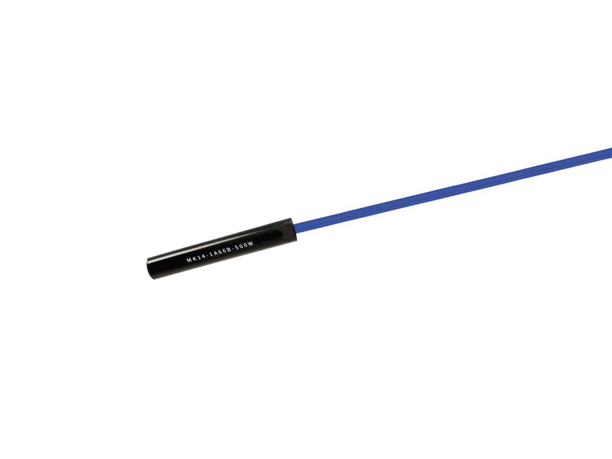 A blue cable is attached to a small black cylindrical Reed Sensor labeled “MPR-LAMB-100K” from the MK14 Series, shown against a white background. by Standex Detect