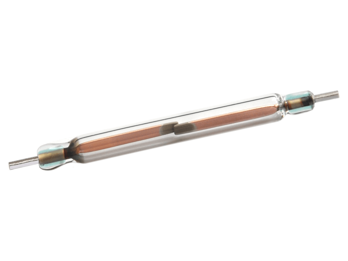 A cylindrical glass reed switch from the KSK-1A54 Series with metal leads on both ends and internal metal contacts, isolated on a white background. by Standex Detect
