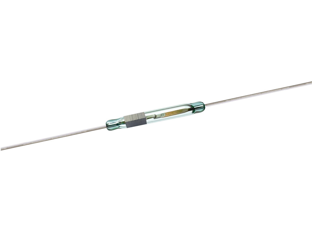 A KSK-1B85 Series Reed Switch features a glass tube with metal leads on both ends, housing a small metal reed inside and a coil wrapped around the center for reliable operation. by Standex Detect