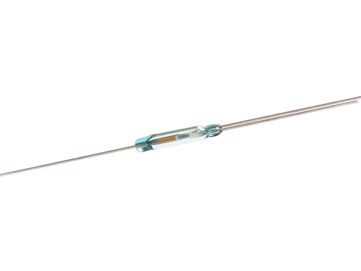 A small cylindrical glass ORT651 Series reed switch with two long metal leads extending from both ends, shown on a white background. by Standex Detect